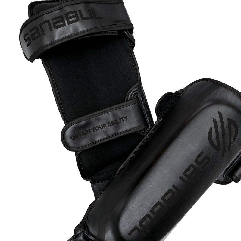 Sanabul Essential Hook and Loop Scheenbeschermers - Zwart